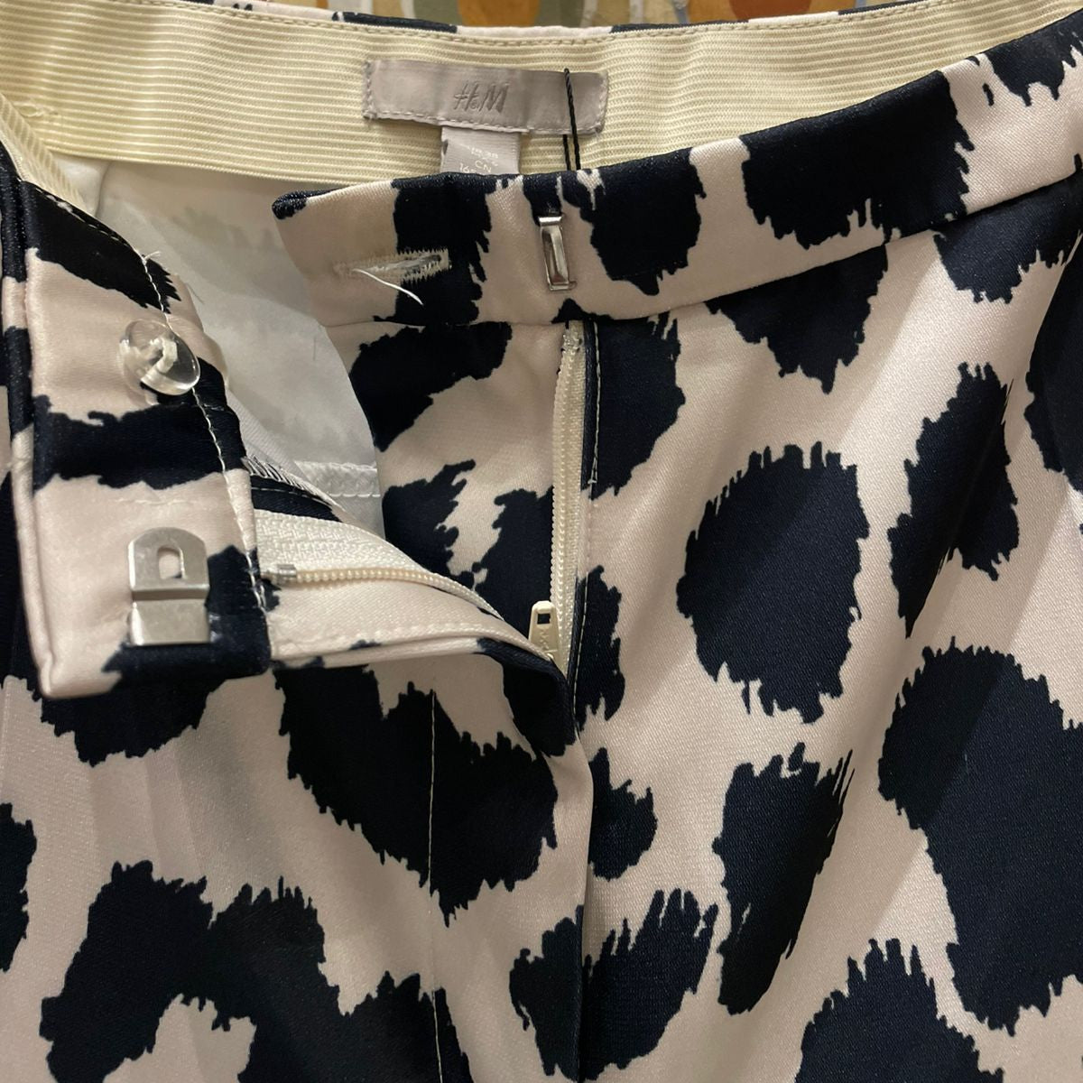 CALCA ANIMAL PRINT ONCA H&M