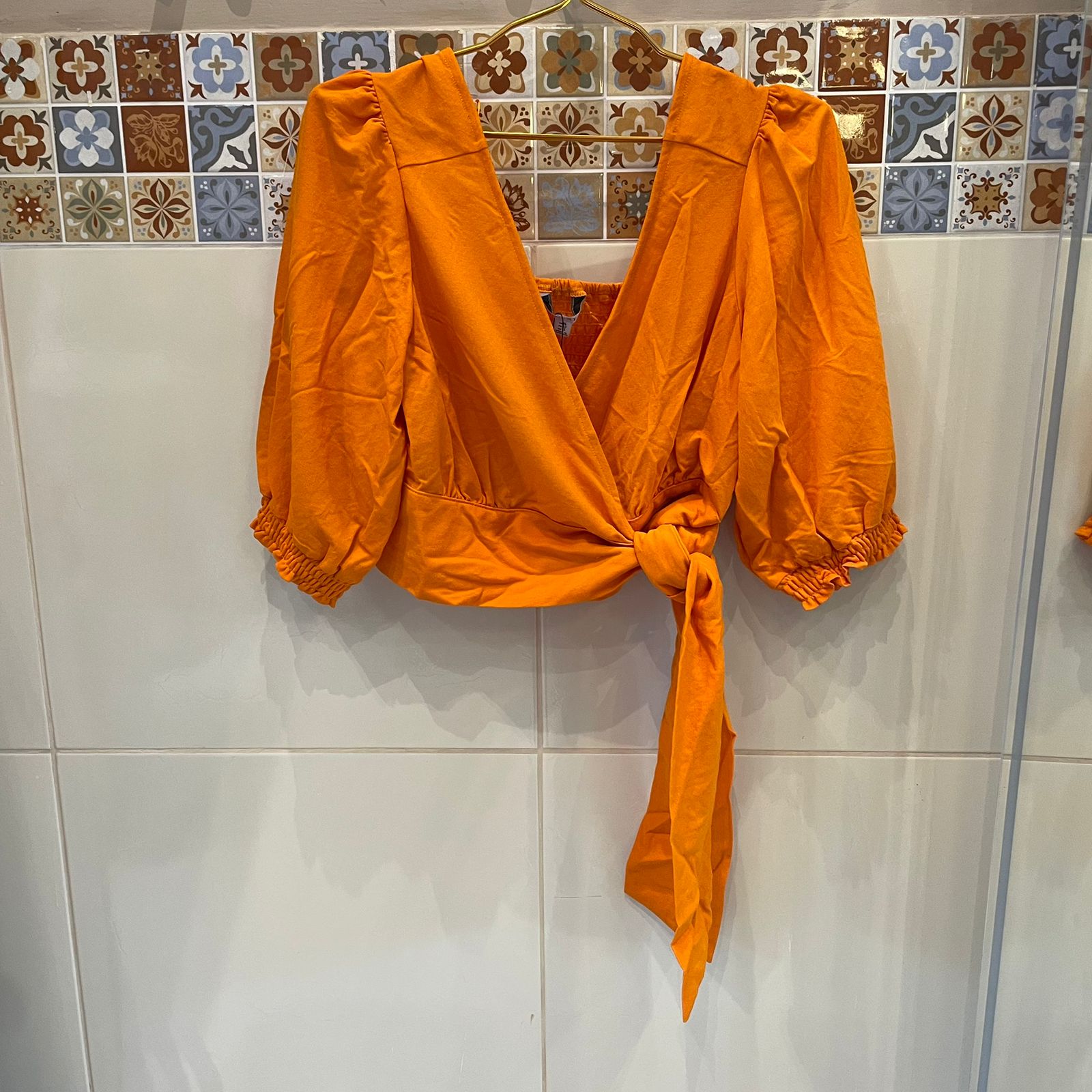 CROPED LARANJA NEXT TAM G