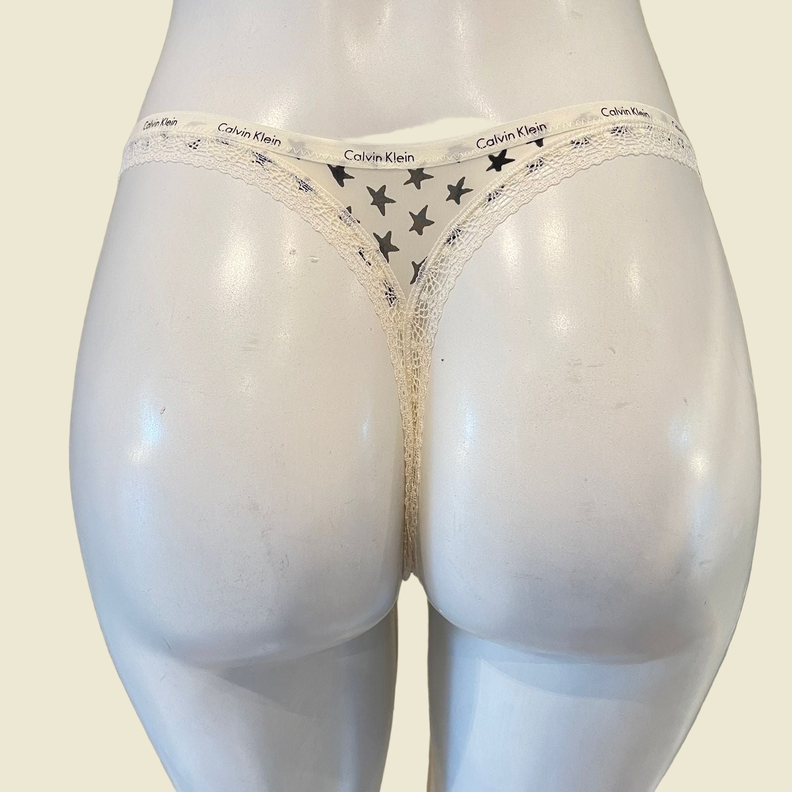 CALCINHA FIO DENTAL CALVIN KLEIN